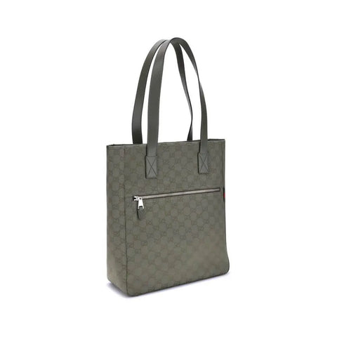 GG canvas medium Tote Bag featuring green leather trimmings and a zippered pocket for everyday use.